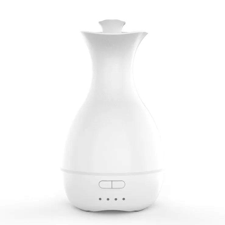 White ultrasonic air humidifier and essential oil diffuser with colourful night light and 200ml water tank