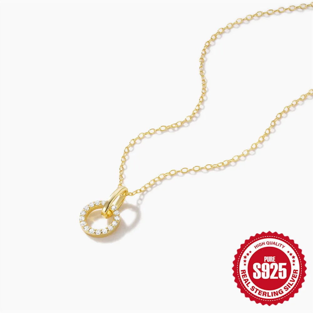 Gold coloured S925 sterling silver adjustable clavicle chain with a geometric round zircon pendant.