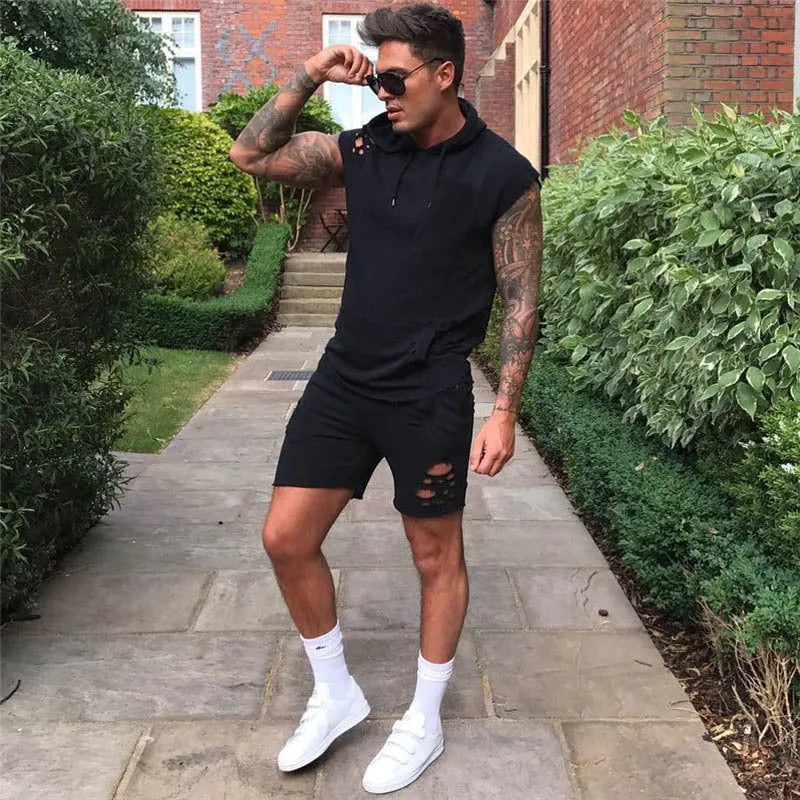Men's cotton blend training suit set with hooded black sleeveless top and matching trousers