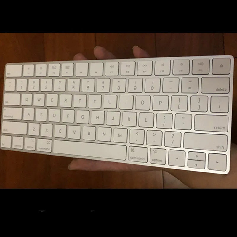 Apple G6 Bluetooth wireless keyboard in white with aluminium construction and multimedia keys