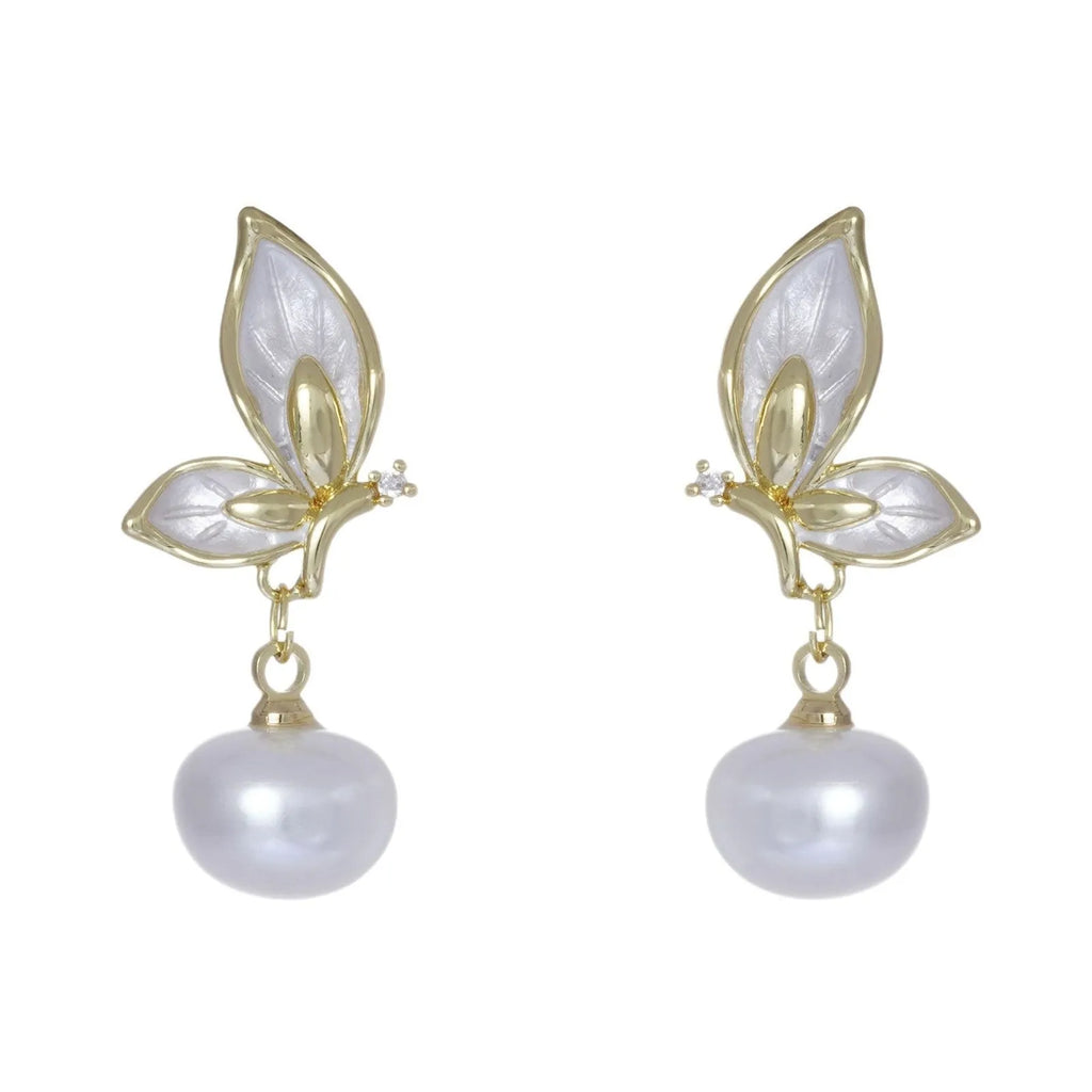 Pair of simple style butterfly earrings for women with electroplated copper construction.