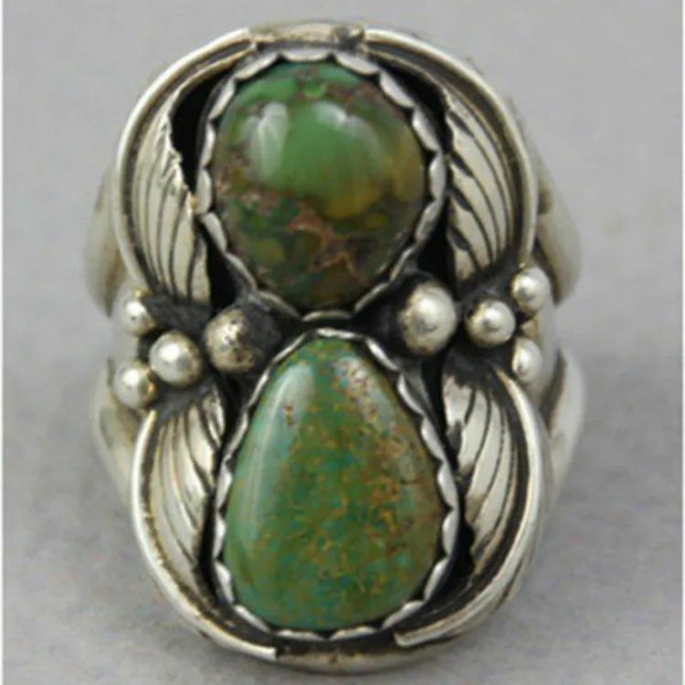 Geometric retro turquoise ring for women with an inlaid design, shown in silver-tone alloy.