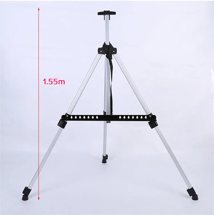 Silver aluminium alloy adjustable painting easel on floor with canvas, folded length 21 inches