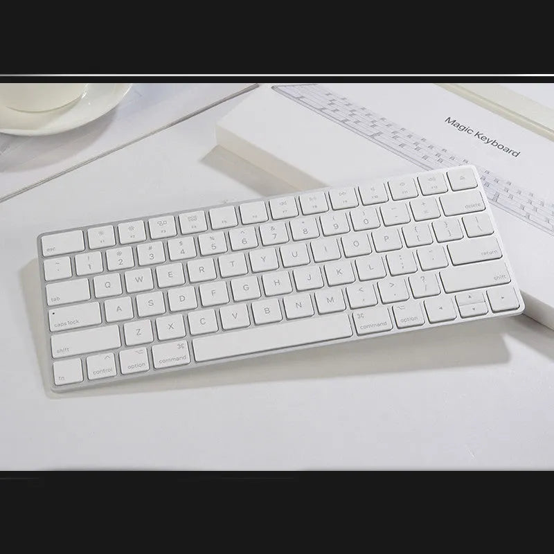 Apple G6 Bluetooth wireless keyboard in white with aluminium construction and multimedia keys