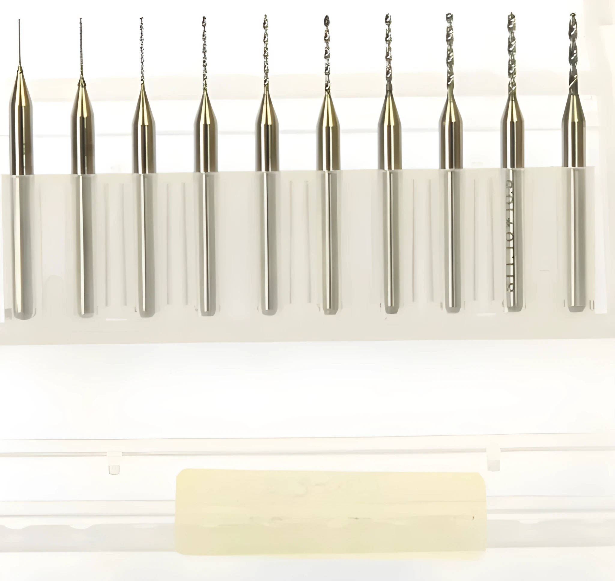 Set of imported tungsten steel micro-engraving bits in various sizes from 0.10mm to 2.00mm diameter.
