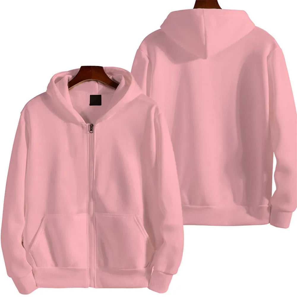 Man wearing a solid colour loose fit full-zip sports jacket.