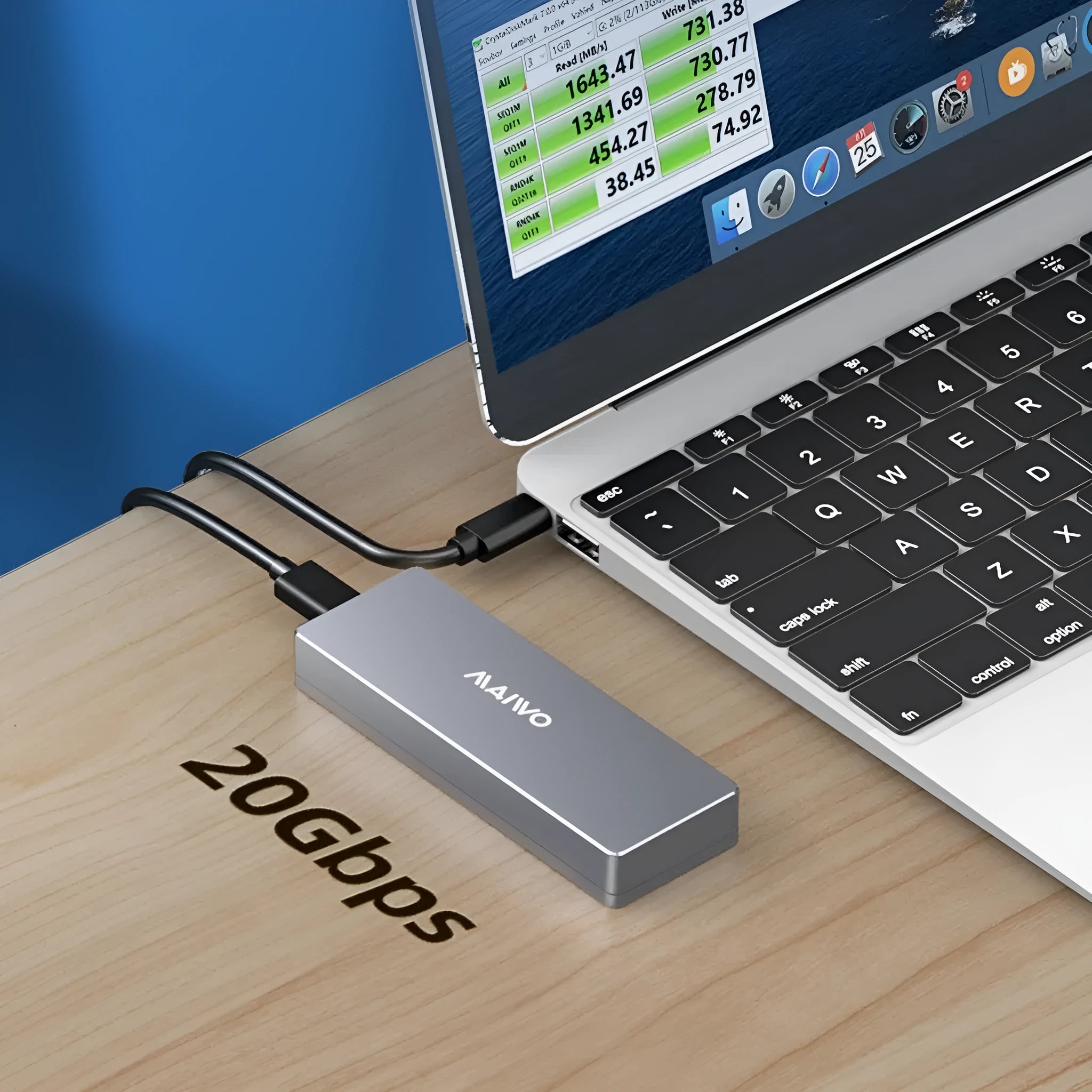 Silver M.2 SATA SSD external hard drive enclosure with Type-C port, screwdriver, screws, heat pad, and cable.