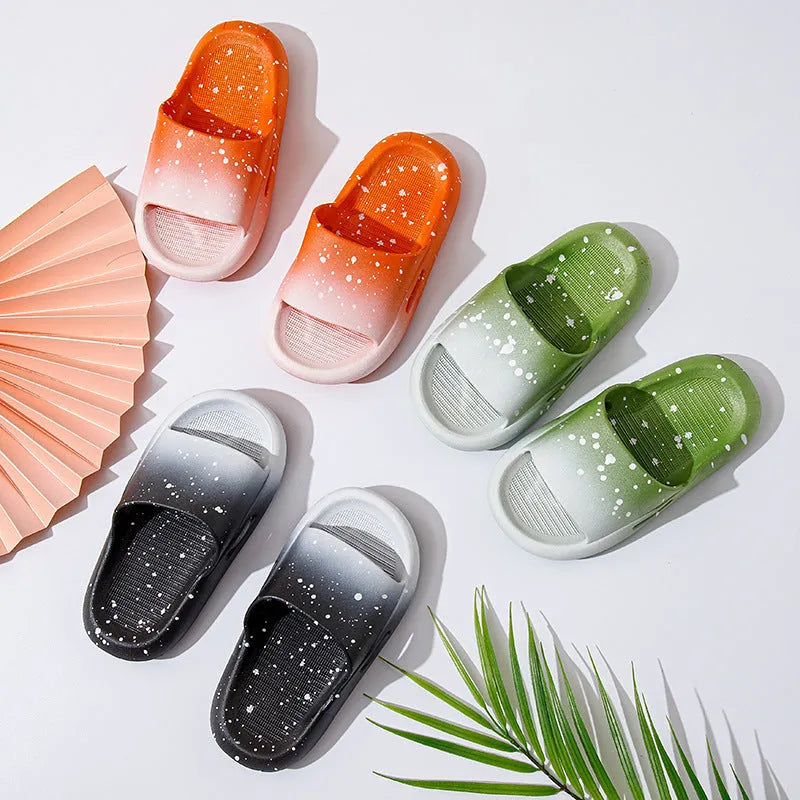 Gradient coloured children's PVC summer slippers with non-slip soles in blue, yellow, green, orange, pink, or black.