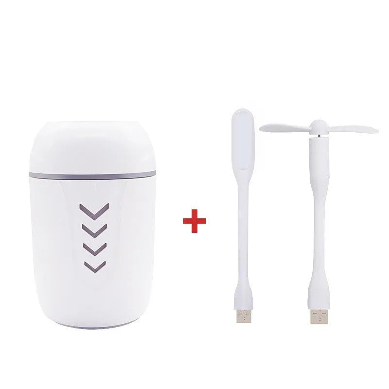 Blue columnar car humidifier with USB cable and mechanical controls on dashboard