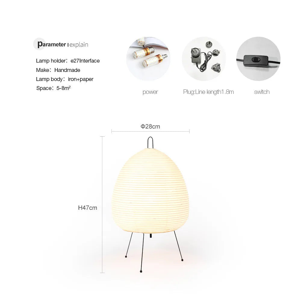 Japanese style rice paper table lamp with aluminium body and decorative shade on wooden surface