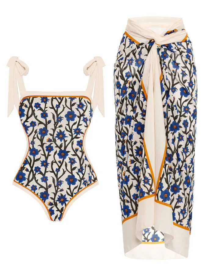 Women's printed floral two-piece swimsuit with a matching chiffon hip skirt.