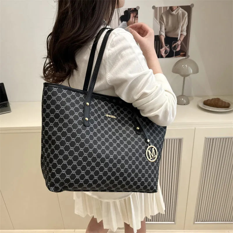 Western style PU leather shoulder bag showing sewing thread detailing, 42cm wide by 28cm tall, available in black, grey, white, and brown colours