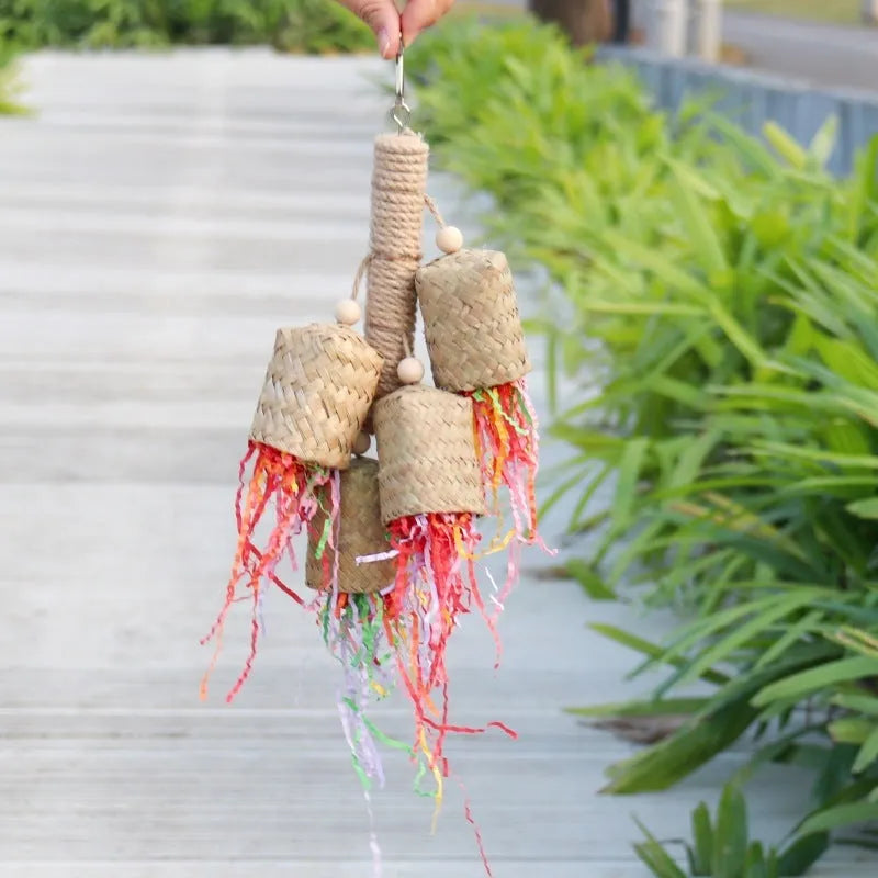 Colourful shredded paper bird chewing toy made from natural wood and sisal rope for parrots