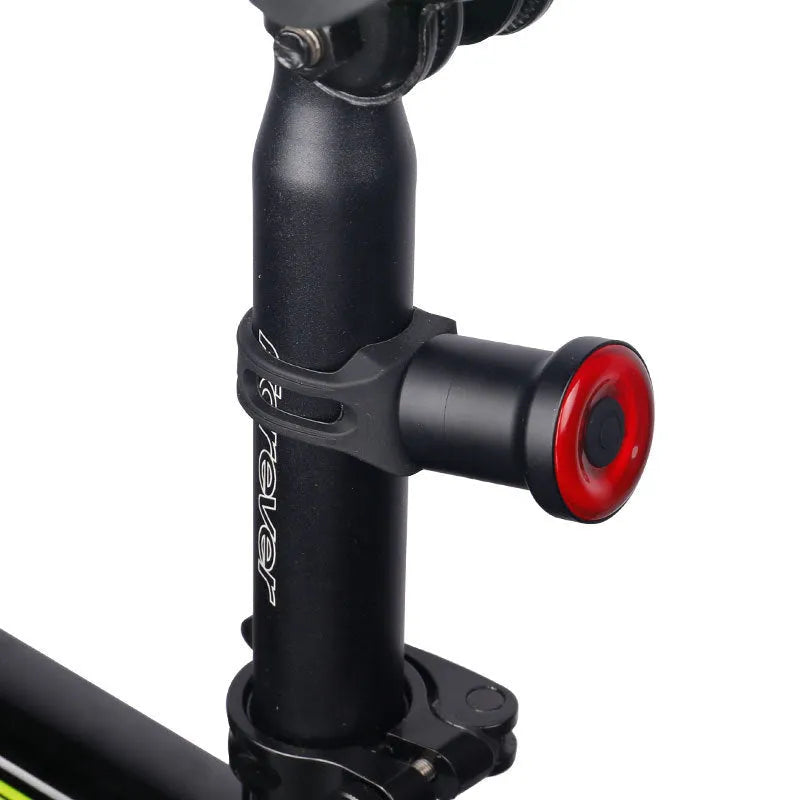 ENFITNIX Xlite100 bicycle taillight with 6061 aluminium chassis, mounted on seat rail, black body with red lens