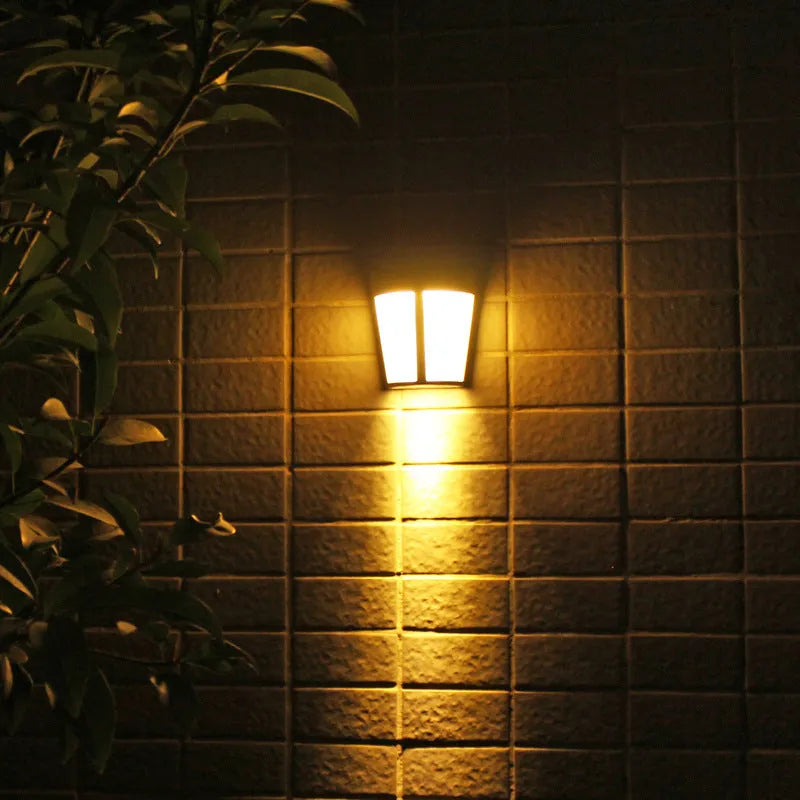 Solar wall lamp with 6 LEDs and IP65 waterproof rating for outdoor garden lighting