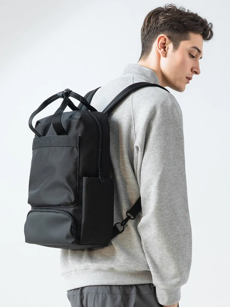 Black Oxford cloth computer backpack with 20-35L capacity for laptops and tablets