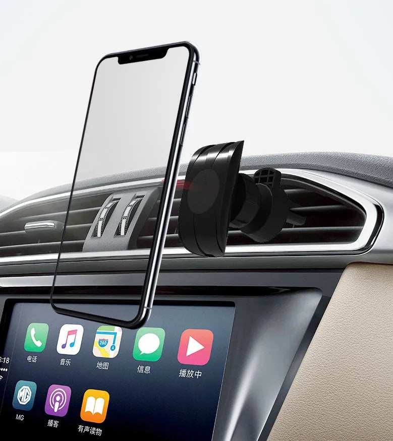Black car phone holder attached to car air vent with adjustable arms holding mobile device