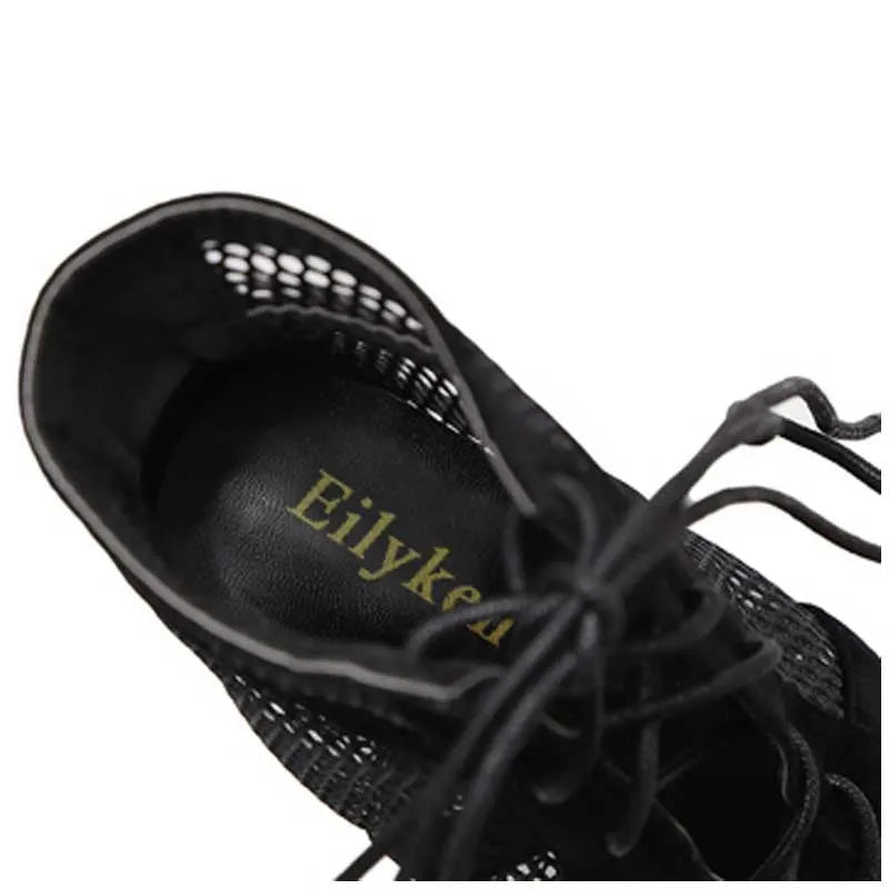 Black suede women's high heel shoes with lace-up front and 11.5cm stiletto heel