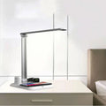 X-1 multi-function LED desk lamp with wireless charging pad in black or white