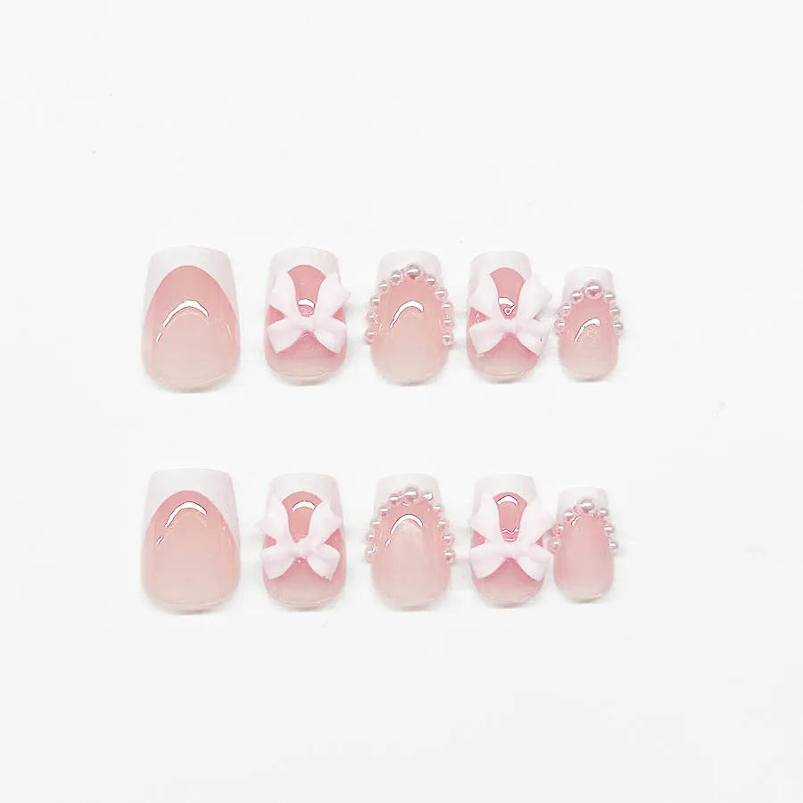 Short French manicure nail art set with bow, tulip, starry sky, and leopard print designs