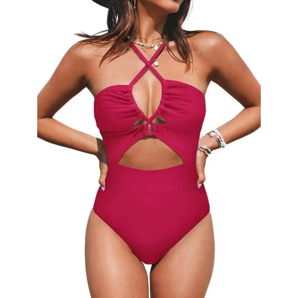 Women's black one-piece backless swimsuit made from polyester and spandex on a mannequin.