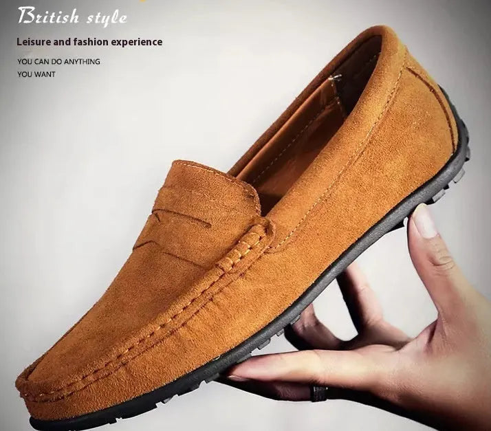 Men's brown suede leather casual shoes with round toe and flat rubber sole on a white background