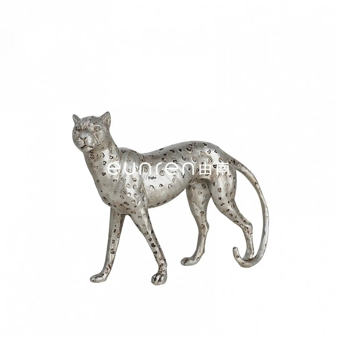 Modern leopard figurine resin ornament on a shelf