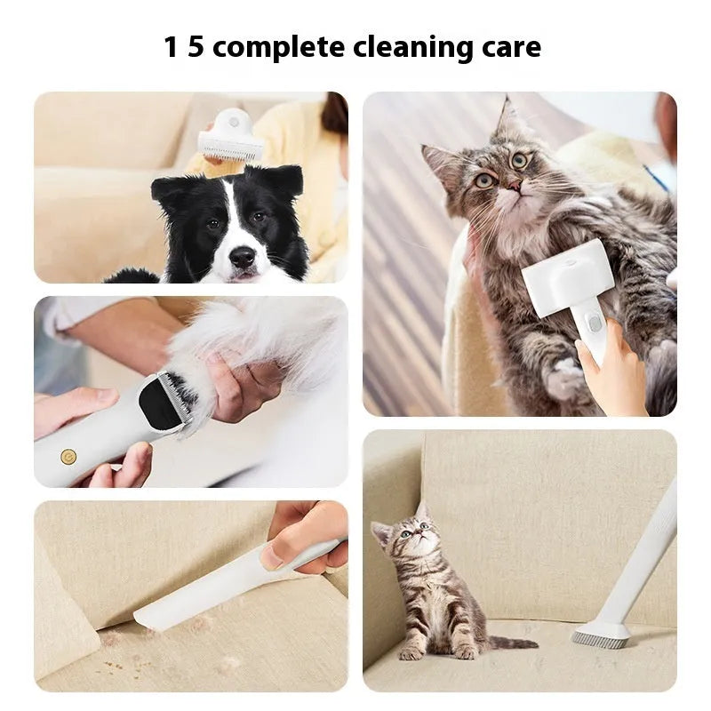 Pink and white pet grooming vacuum cleaner with hose, shear attachment, and grooming combs on a white background.