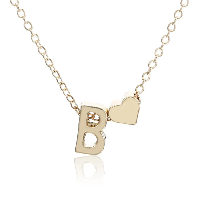 Peach heart shaped letter necklace pendant in gold or silver alloy jewellery