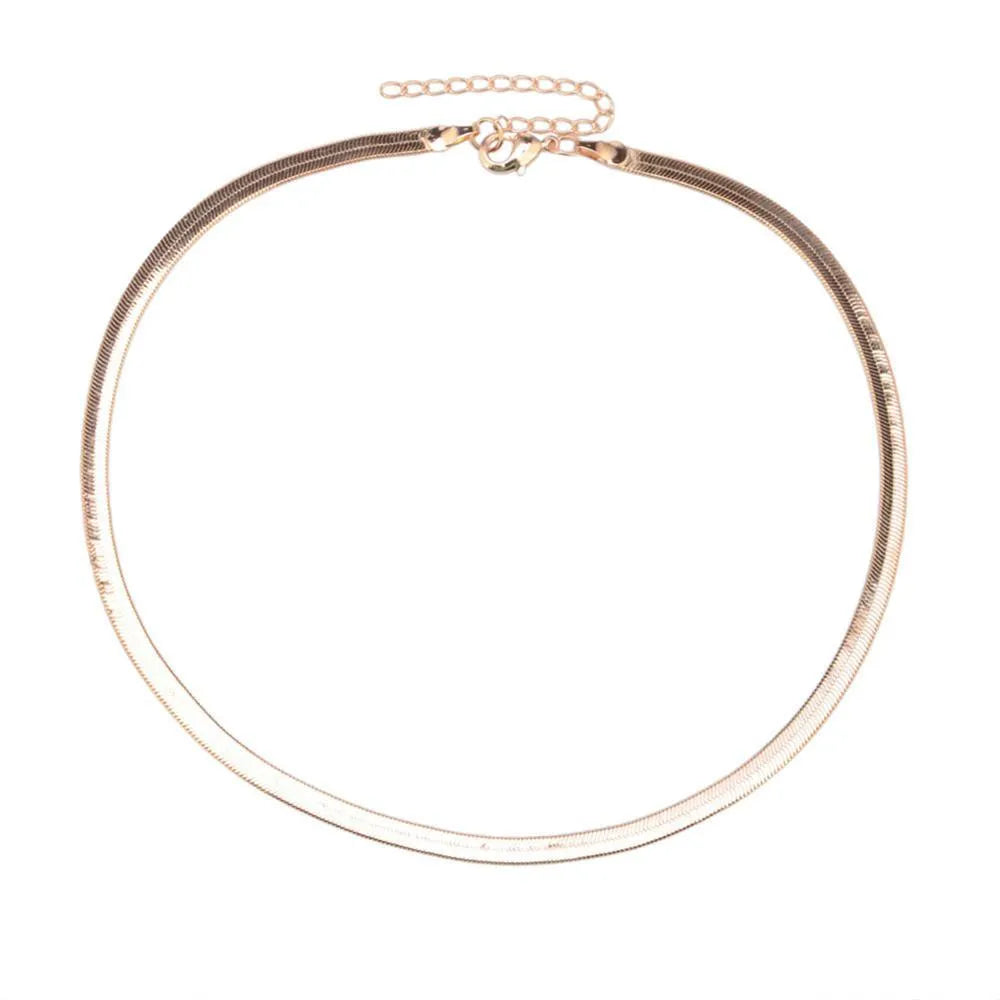 Star Goddess gold duo layering choker necklace on display