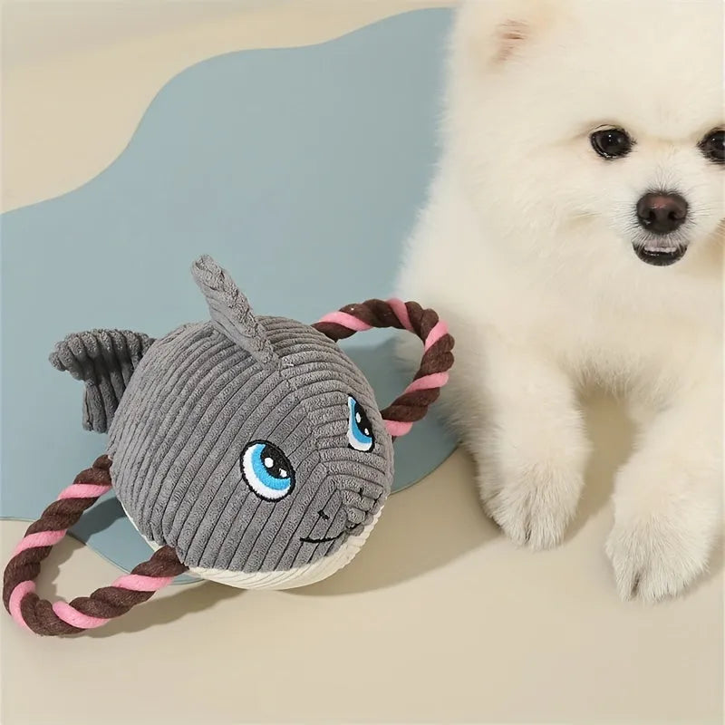 Turtle shaped dog chewing toy in gray green or orange plush fabric with knotted limbs for interactive pet play