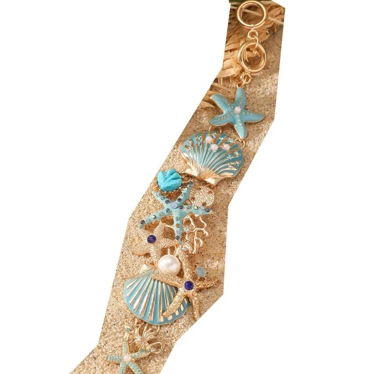 Alloy rhinestone starfish bracelet with boat anchor charm in blue, red, or turquoise.
