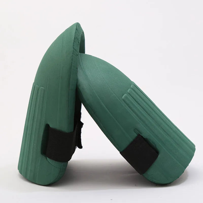 A pair of high-density EVA foam knee pads for gardening and work, shown in army green colour.