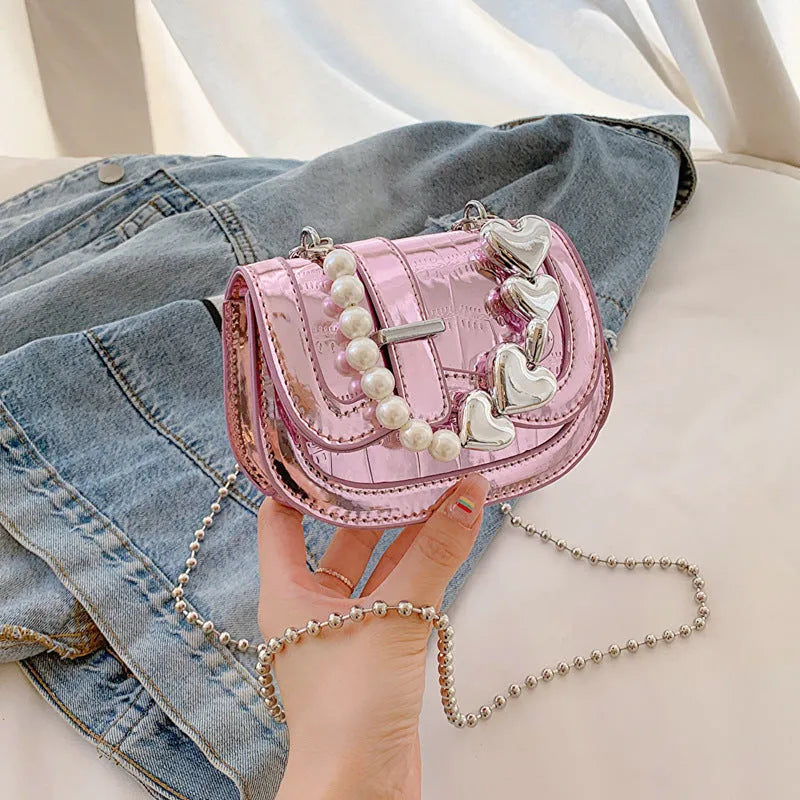 Horizontal square mini saddle bag in PU leather with sandwich pocket detail and adjustable shoulder strap