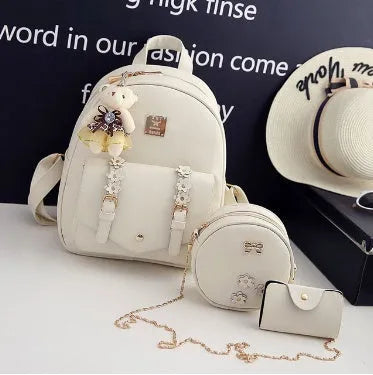 Women's 3-piece leather bag set with floral designs including backpack, shoulder bag and card wallet
