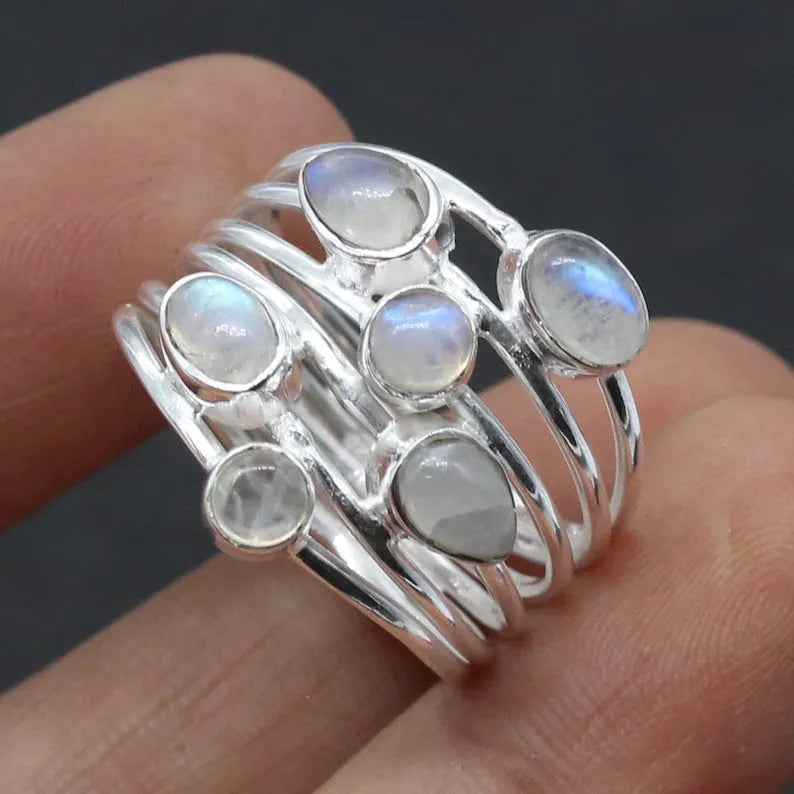 Silver irregular wide band ring for women made of zinc alloy on plain background showing full shape