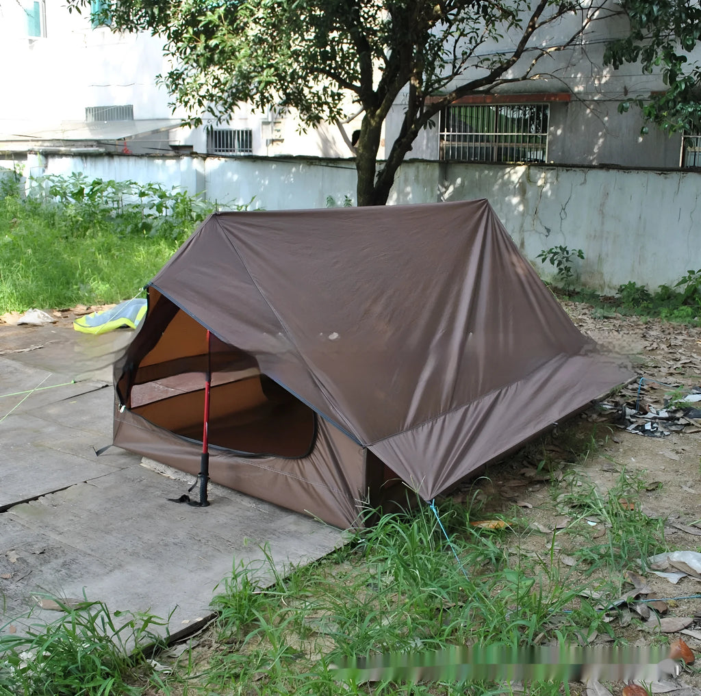 Brown or white A-line cabin tent using hiking canes for support with dimensions 210x150x110cm