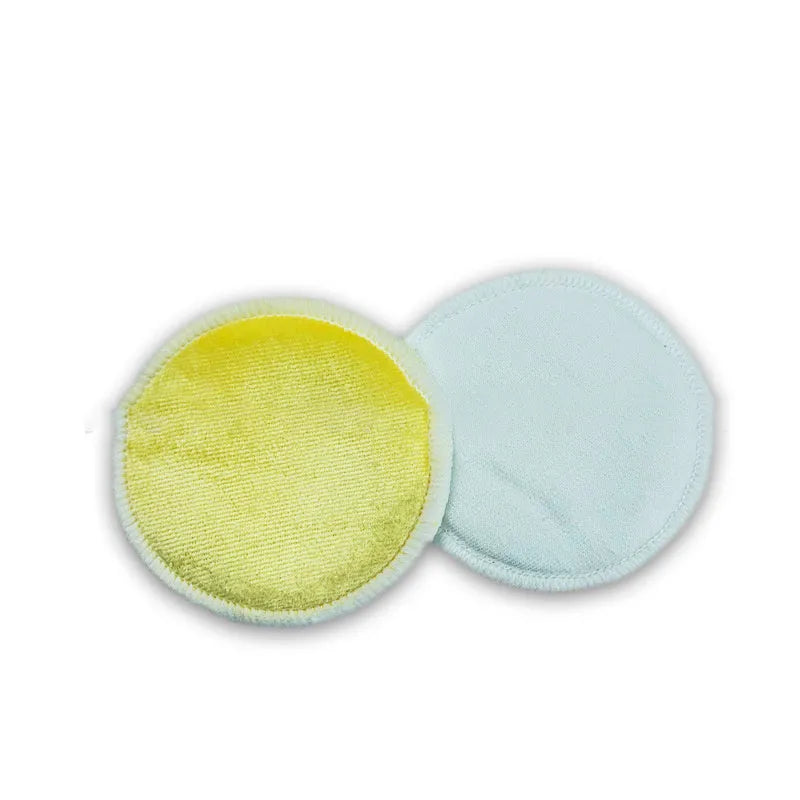 Set of eight pink and blue velvet makeup remover pads next to an organic cotton mesh drawstring bag.