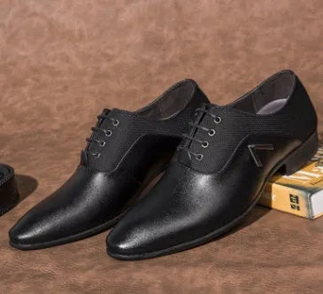 Men's black Oxford shoe with artificial PU upper and rubber sole, business casual style.