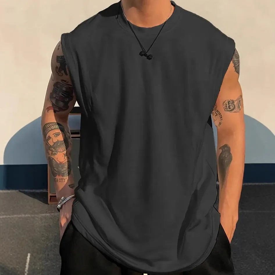 Men's loose solid colour cotton tank top sleeveless t-shirt on a hanger.