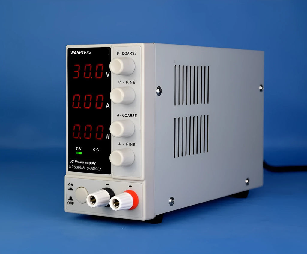 White adjustable DC bench power supply with display, model S605W, for electronics testing.