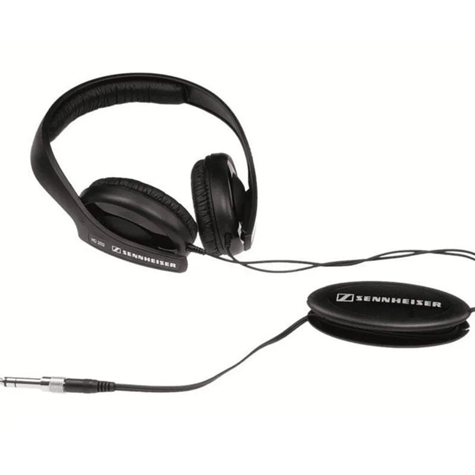Black head-mounted monitor headphones with over-ear cups, a built-in microphone, and a long cable with a 3.5mm plug.