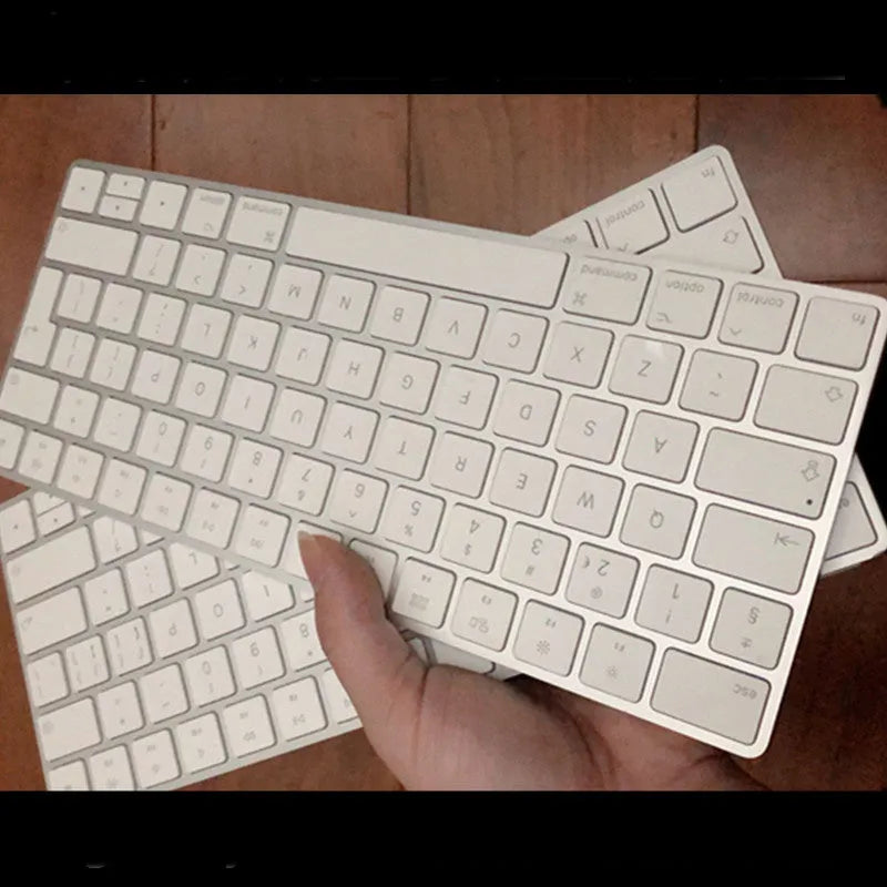 Apple G6 Bluetooth wireless keyboard in white with aluminium construction and multimedia keys