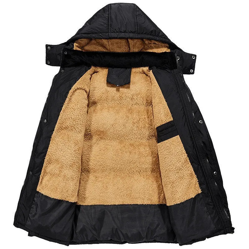 Men's black velvet padded jacket with hood and double-breasted buttons, showing loose fit.
