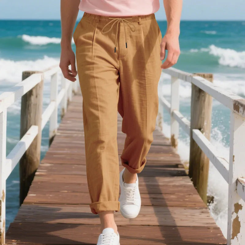 Men's casual linen trousers in light khaki colour with drawstring waist and straight leg