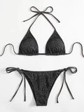 Women's black bandage bikini swimsuit with split detail briefs and matching top.