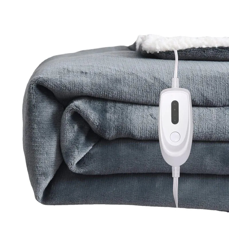 Grey and white USB electric heating blanket with intelligent temperature control on a sofa.