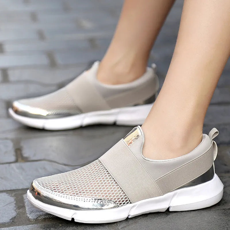 Blue, black, and grey women's low-cut sneakers with breathable mesh and a PU midsole