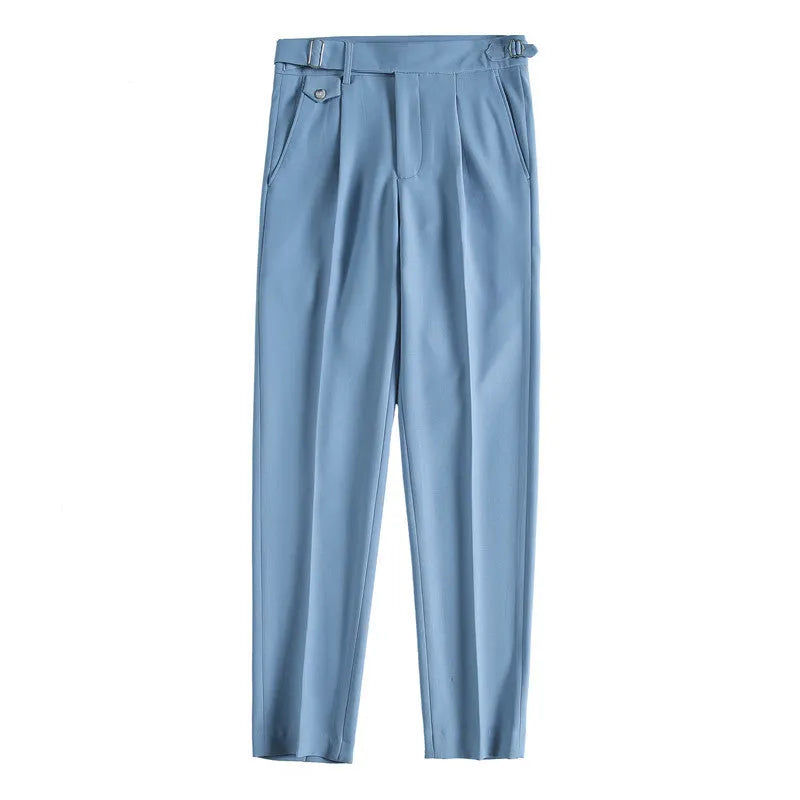 Straight-leg solid colour casual trousers in polyester on a size chart showing waist sizes 29 to 36.