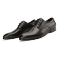 Men's black cow leather Derby shoes with pointed toe and rubber sole on a plain background